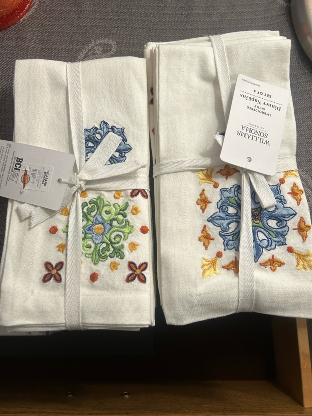 NWT Williams Sonoma White Dinner Napkins with Blue, Green and Yellow Embroidery - Picture 2 of 6